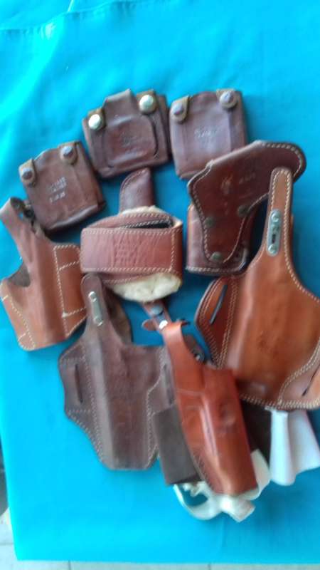 LEATHER HOLSTERS +CARTRIDGE POUCHES