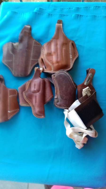 LEATHER HOLSTERS +CARTRIDGE POUCHES