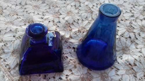 2 BLUE GLASS BOTTLES