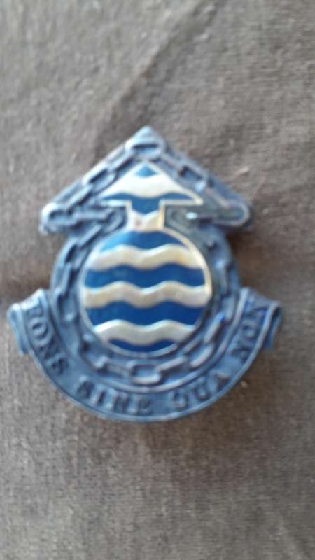 SADF  ORDINANCE SERVICES  CORPS BADGE    " FONS SINE QUA NON"