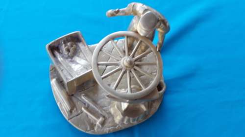 VINTAGE SOLID   BRASS ORNAMENT  "BLACKSMITH AT WORK ON HIS TRADE"
