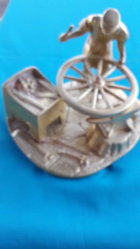VINTAGE SOLID   BRASS ORNAMENT  "BLACKSMITH AT WORK ON HIS TRADE"