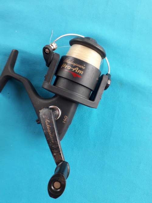"SHAKESPEARE "    'PRO -AM  140'  FISHING REEL WITH LINE