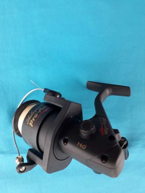 "SHAKESPEARE "    'PRO -AM  140'  FISHING REEL WITH LINE