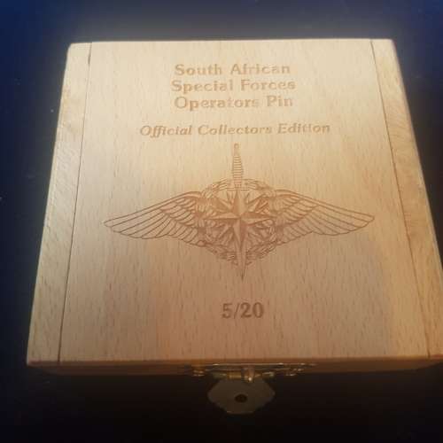 RECCE limited edition collectors  operator badges in gold.