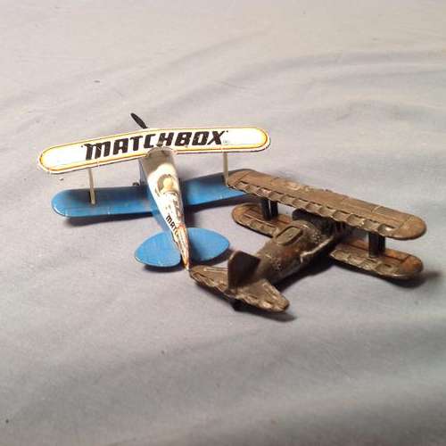 No 187.  One matchbox airplane one gold  airplane