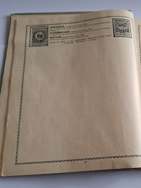 `The Triumph Stamp Album` -  empty (no stamps) - +/- 23cm x 19cm
