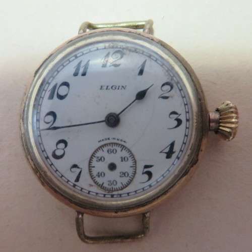 Old ELGIN Goldplated watch movement for parts**