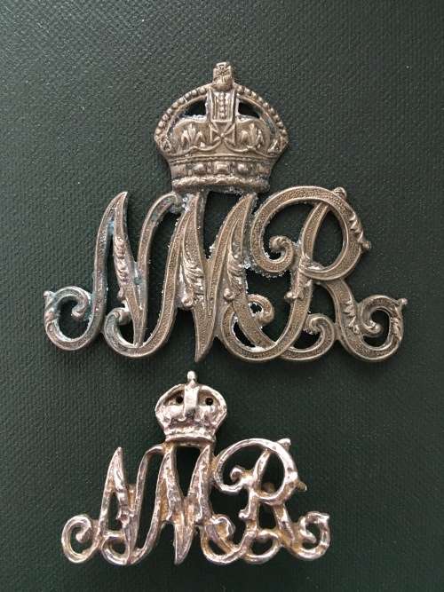 Pair of Natal Mounted Rifles badges ** small one is cast**