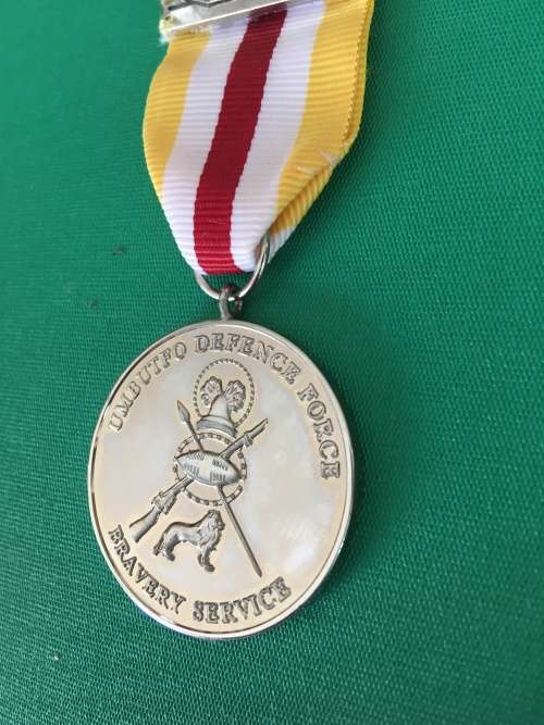 Original and Scarce Full Size SWAZILAND medal for - BRAVERY SERVICE Umbutto defence Force.