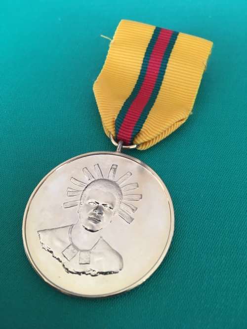 Original and Scarce Full Size Gold plated SWAZILAND medal for -  DISTINGUISHED Service**