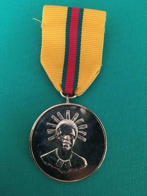 Original and Scarce Full Size Gold plated SWAZILAND medal for -  DISTINGUISHED Service**