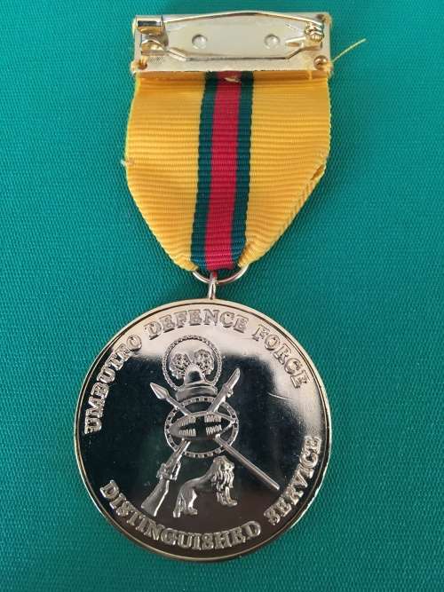 Original and Scarce Full Size Gold plated SWAZILAND medal for -  DISTINGUISHED Service**