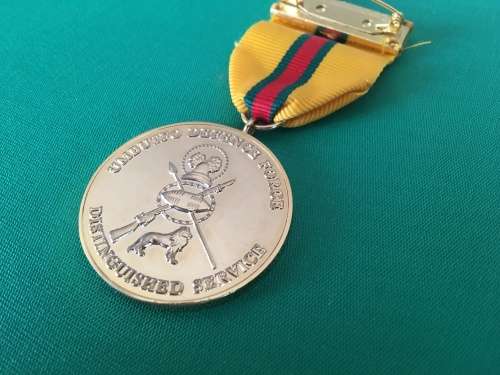 Original and Scarce Full Size Gold plated SWAZILAND medal for -  DISTINGUISHED Service**