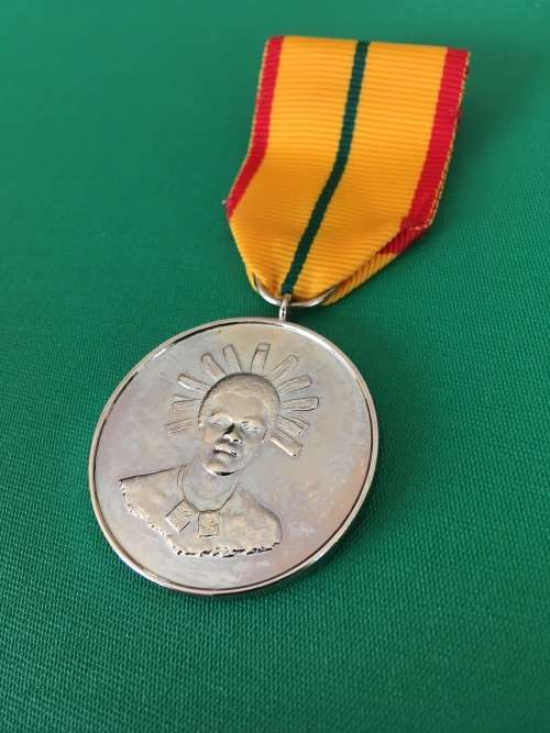 Original and Scarce Full Size SWAZILAND medal for - MERITORIOUS Service