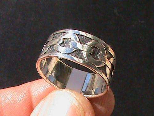 STERLING SILVER RING. SIZE T 9MM WIDE