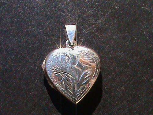 STERLING SILVER HEART SHAPED LOCKET