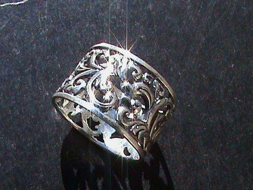 STERLING SILVER FILIGREE RING..... SIZE O (12 MM WIDE)
