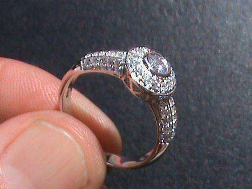 SOLID STERLING SILVER ENGAGEMENT RING WITH  CUBIC ZIRCONIAS...SIZE Q