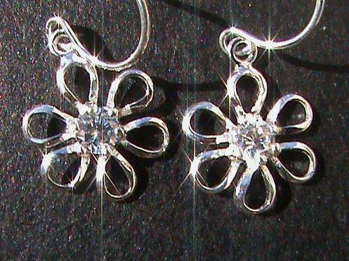 STERLING SILVER EARRINGS SET WITH WHITE CUBIC ZIRCONIAS....