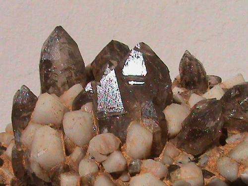 SMOKEY QUARTZ CRYSTALS ON FELDSPAR CRYSTALS.......MALAWI