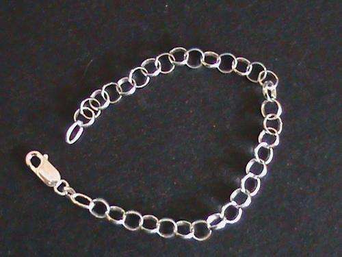 STERLING SILVER CHARM BRACELET...........20CM LONG