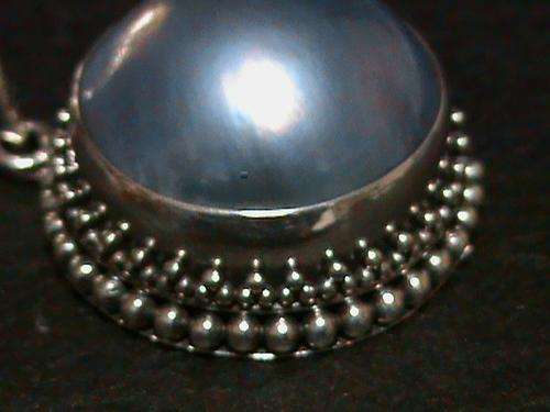 LARGE BLUE MABE PEARL SET IN STERLING SILVER.....