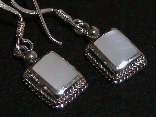 STERLING SILVER EARRINGS.....MOTHER OF PEARL STONES