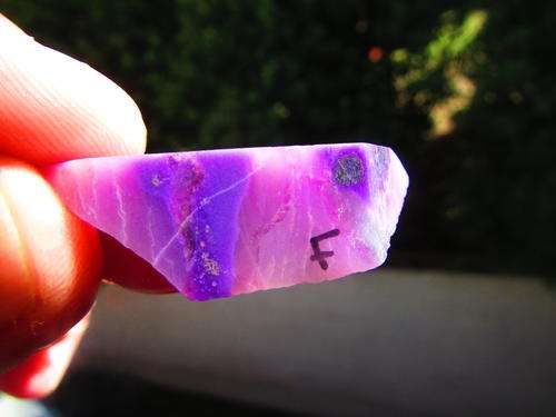 SUGILITE CUTTING MATERIAL.  A GRADE .   VERY RARE