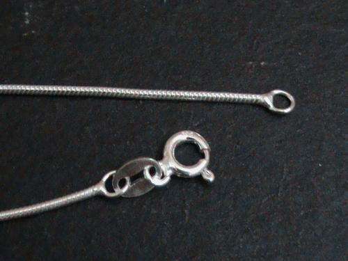 55 CM LONG SOLID STERLING SILVER SNAKE CHAIN.