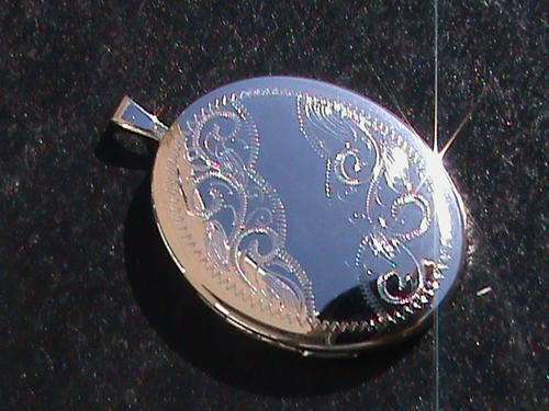 LARGE OVAL LOCKET IN SOLID STERLING SILVER