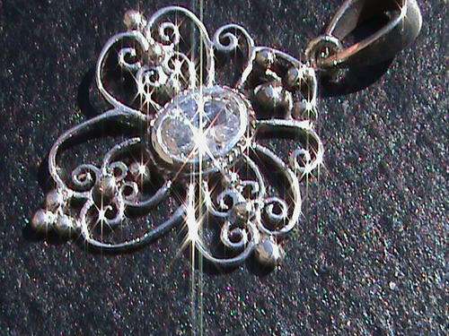 SOLID STERLING SILVER CROSS.  WHITE CZ STONE