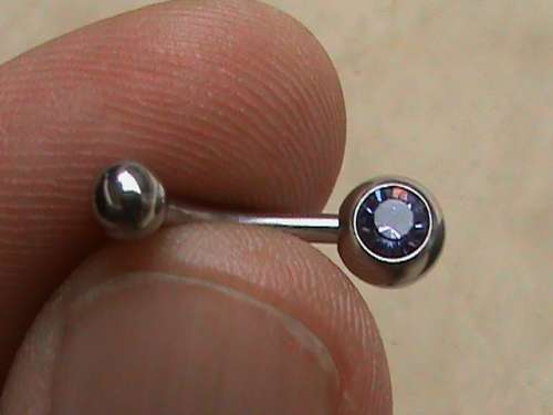 SURGICAL STEEL BELLY RING .  PURPLE STONE