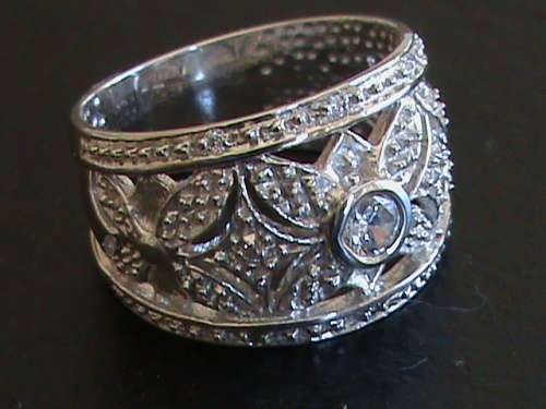 SOLID STERLING SILVER RING.  WHITE CZ STONE