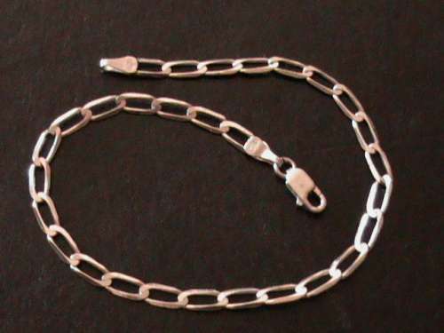 SOLID STERLING SILVER BRACELET.   22 CM LONG