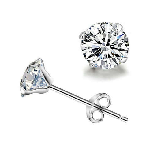 SOLID STERLING SILVER STUD EARRINGS.   5 MM ROUND STONES.