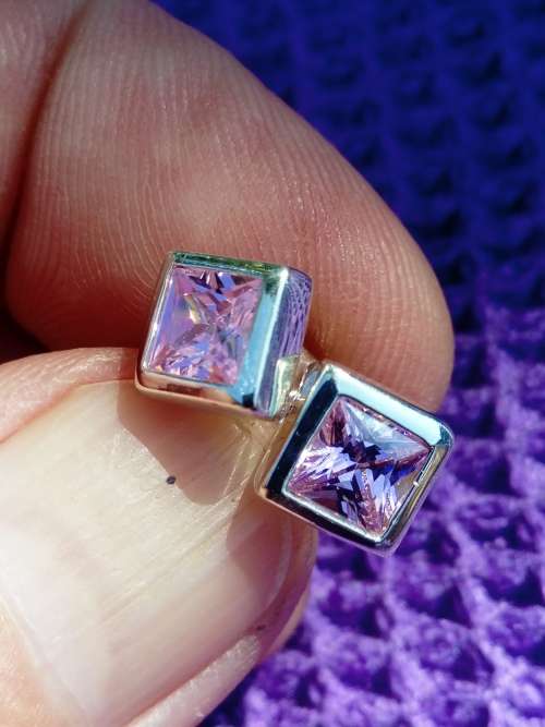 SOLID STERLING SILVER STUDS.  PINK CZ STONES.
