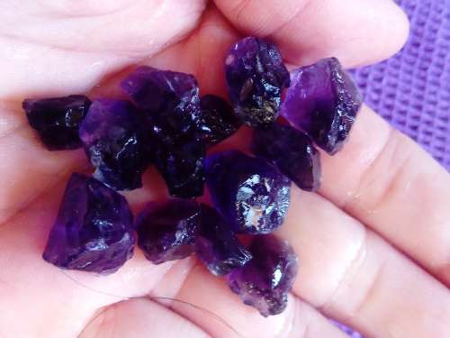 ZAMBIAN AMETHYST.  30 PLUS GRAMS.  GOOD QUALITY TO CUT FOR CABOCHONS.