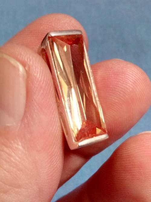 SOLID STERLING SILVER PENDANT.  ORANGE CZ STONE
