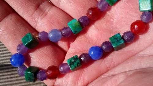 MIX GEMSTONE BRACELET.  STRUNG ON ELASTIC.