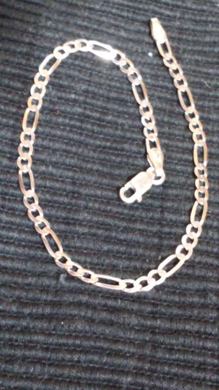 SOLID STERLING SILVER BRACELET.  19CM LONG X 3 MM WIDE.