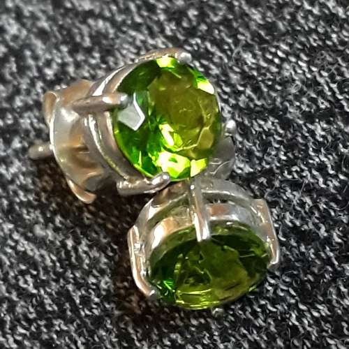 SOLID STERLING SILVER STUDS.  6 MM ROUND CZ STONES.