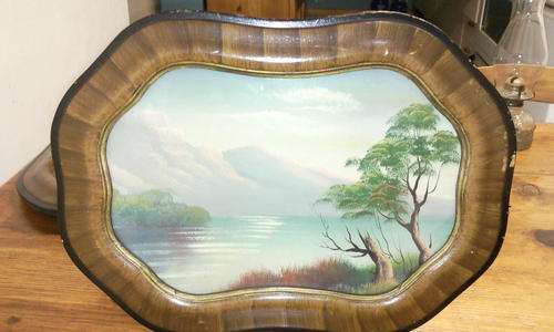 Vintage wooden frame with painting and glass