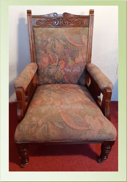 ANTIQUE EDWARDIAN GRANDFATHER CHAIR ON CASTORS  SOLID TEAK