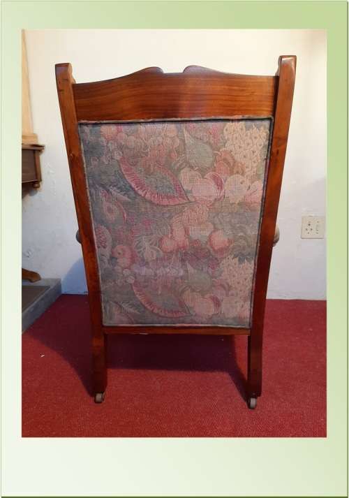 ANTIQUE EDWARDIAN GRANDFATHER CHAIR ON CASTORS  SOLID TEAK
