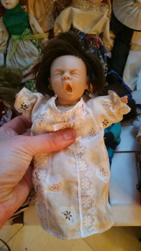 A Collection of 12 Vintage doll, 9 Porcelain and 3 Plastic