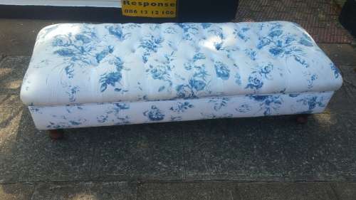 Gorgeous! A Double Seater Ottoman with Deep Pressed Buttons Upholstered in a fabric Blue/White Roses