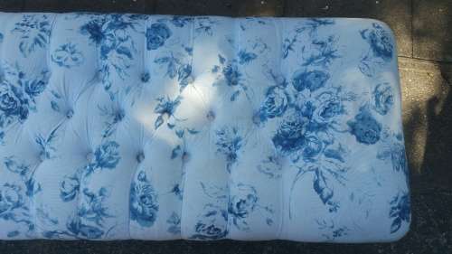 Gorgeous! A Double Seater Ottoman with Deep Pressed Buttons Upholstered in a fabric Blue/White Roses