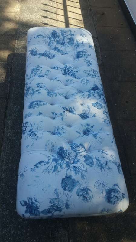 Gorgeous! A Double Seater Ottoman with Deep Pressed Buttons Upholstered in a fabric Blue/White Roses