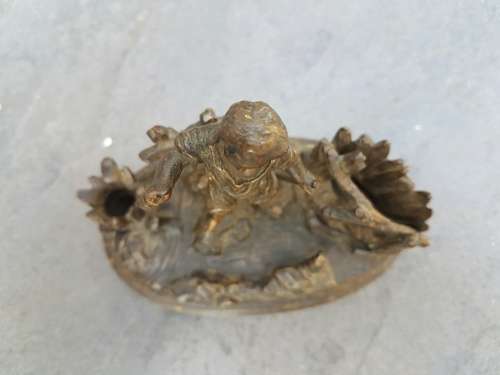 A C1900 Parcel Gilt Bronze Casting of a Child in a Landscape with Vesta Holder and Striker
